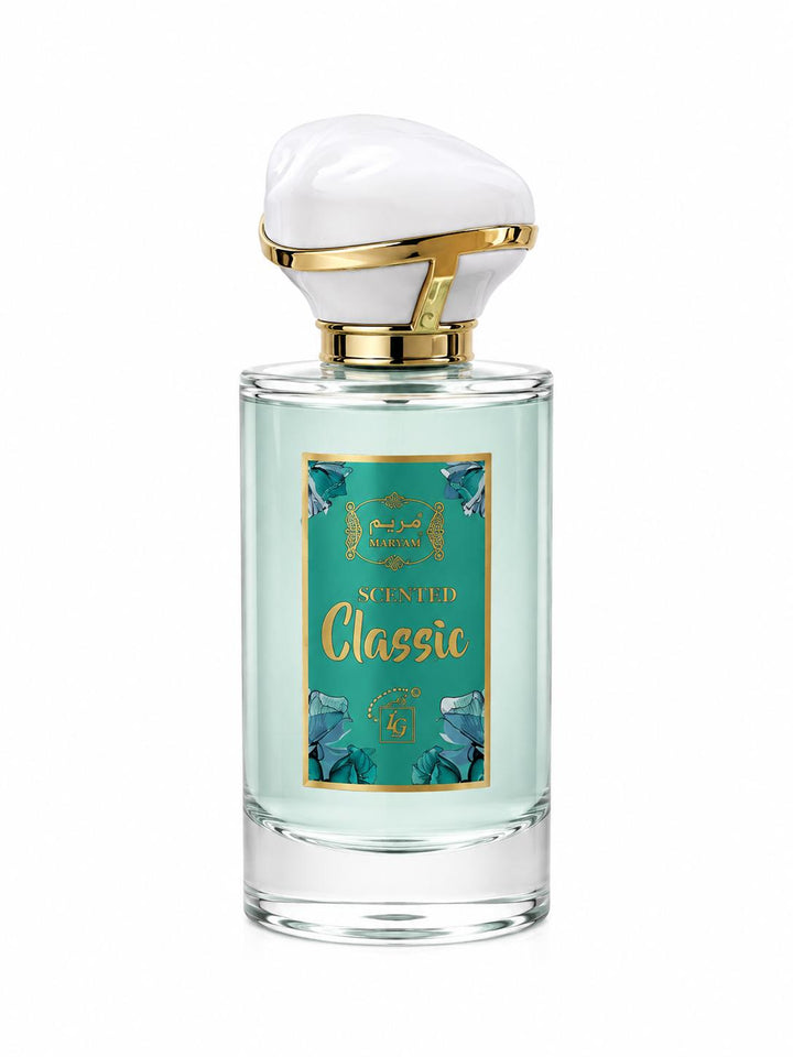 A clear glass bottle of scented liquid with a white sculptural cap, gold trim, and a teal label reading 'Scented Classic' on a white background.