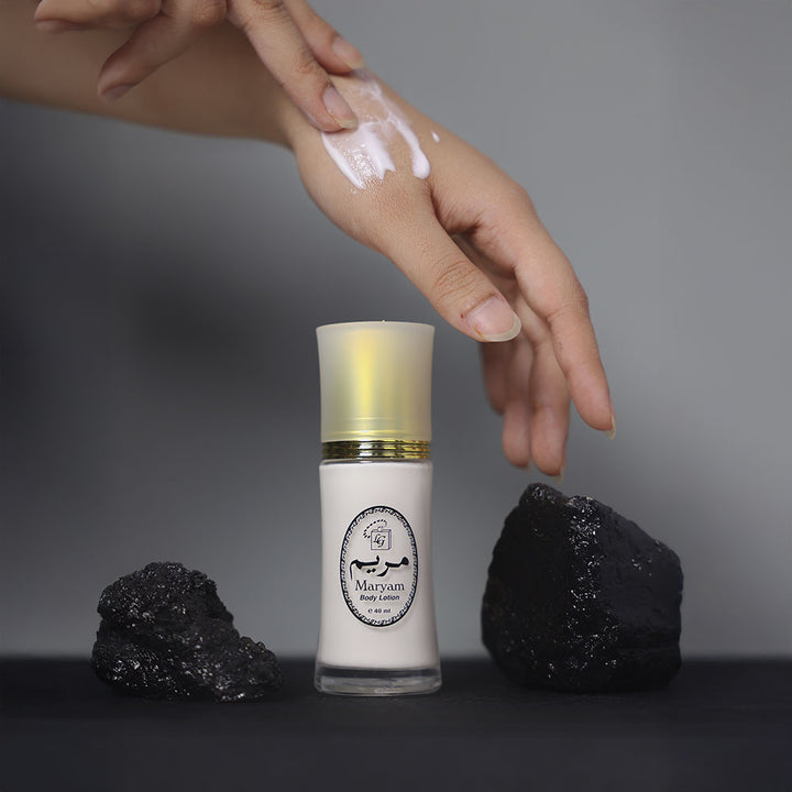 applying maryam body lotion on hand for radiant glowing skin with a scented, non-greasy moisturizing formula