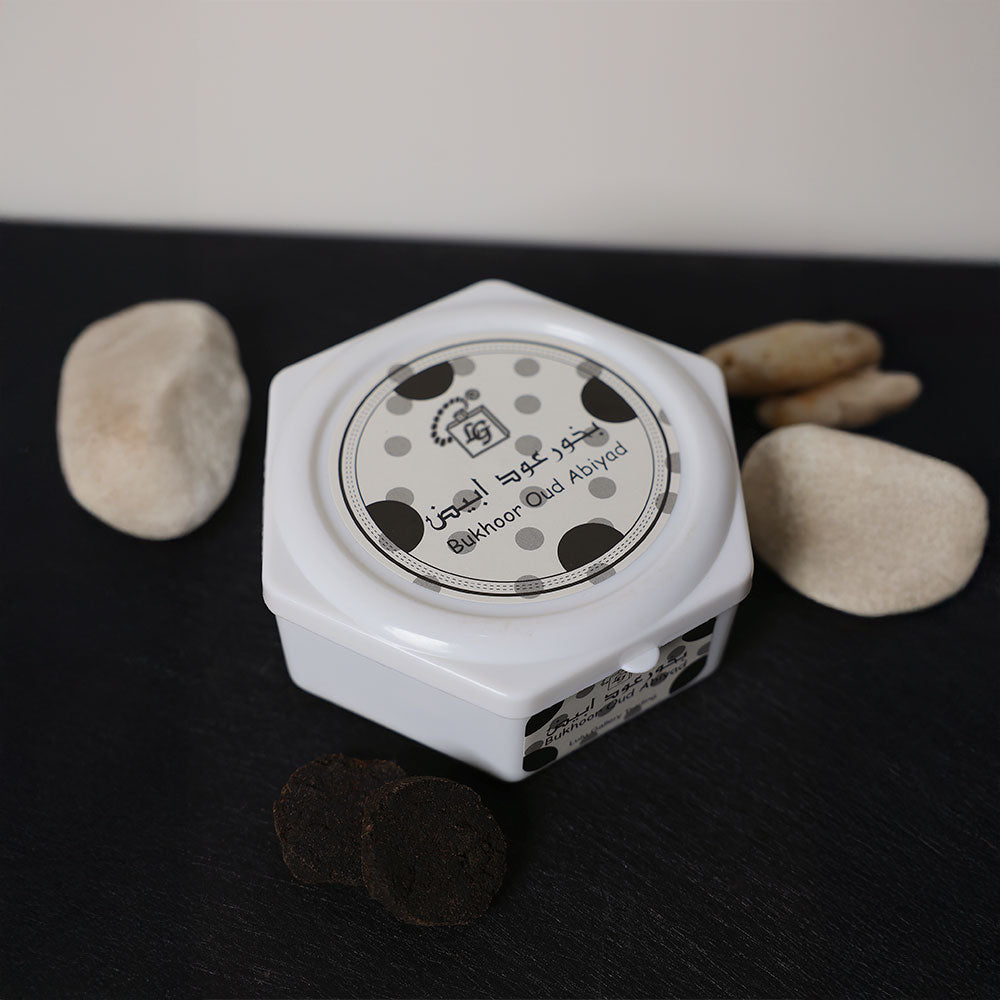oud abiyad bakhoor clean white oud, soft florals, and musky woody home fragrance by lulu gallery